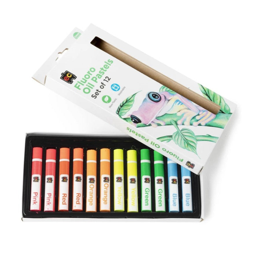 Set of colorful oil pastels with a box on a white background